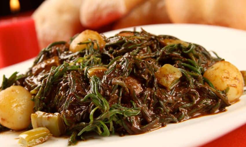 Romeritos, once an indigenous vegetarian food, now is often made with shrimp.