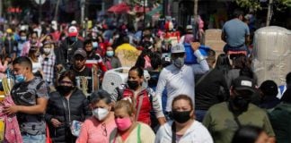 Shoppers filled the streets of downtown Mexico City after Friday's announcement of restrictions.