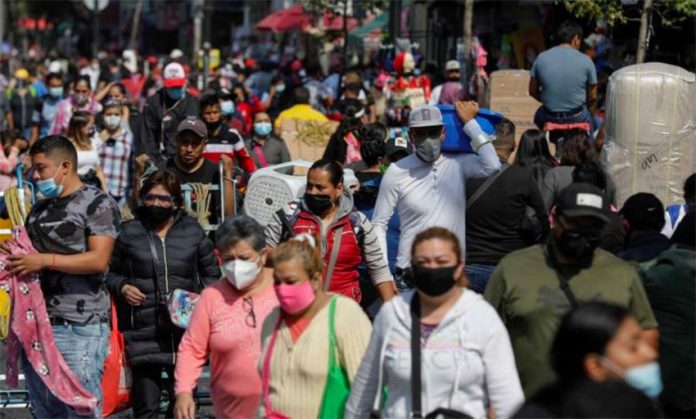 Shoppers filled the streets of downtown Mexico City after Friday's announcement of restrictions.