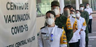 Candidates for Covid vaccination line up at a military hospital in Mexico City.