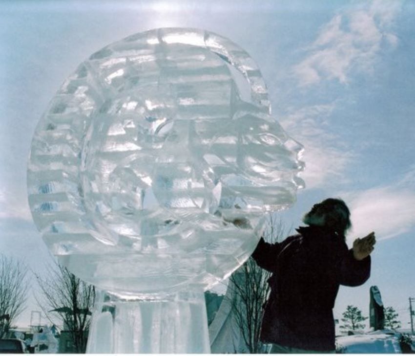 Abel Ramírez Aguilar with his Mayan glyph ice sculpture at the International Competition of Ice Sculpture in Higashikawa, Japan, in 1995.
