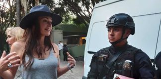 Yo Amo Polanco distributing food packages to local police.