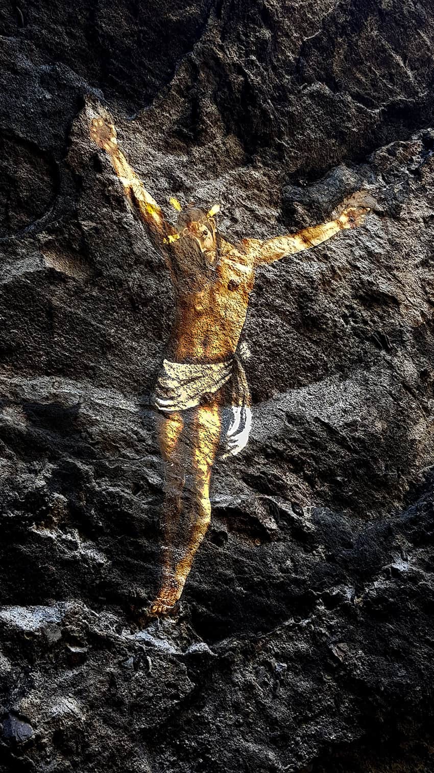 Close-up of the crucifix painted on the ceiling.