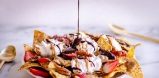 Topped with chocolate and fresh fruit, nachos make an appealing dessert.