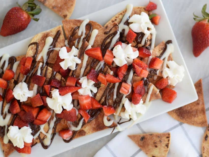 With some creativity, nachos dress up nice as a party platter.