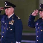 Generals Cienfuegos, left, and Sandoval.