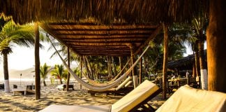 At Puerta Paraíso you can lounge all day on the beach and ask to dine there too.