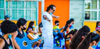 Juan Rubén Antúnez teaches guitar to students in poor neighborhoods for free.