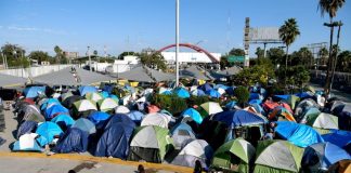 A makeshift migrant camp in Matamoros by the US border.