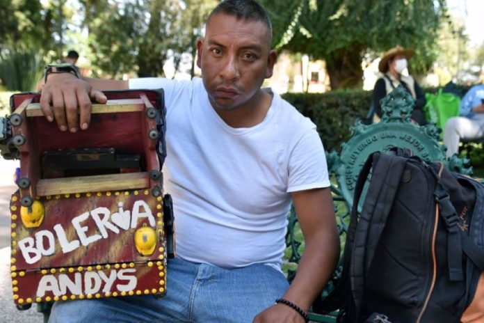 These days, Guadalupe José Medina Tima's shoeshine business makes him 300 pesos a day, the absolute minimum amount that will feed his family.