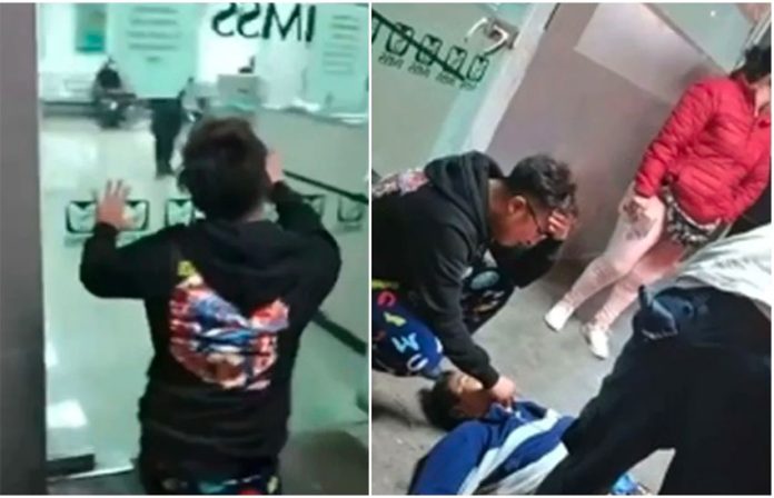 The dead man's son, left, pleads with hospital personnel to open the door