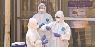 Healthcare workers in Jalisco, where four cases are being studied for a mutation of the virus.