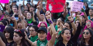 Women march against gender violence at a Mexico City protest in 2019.