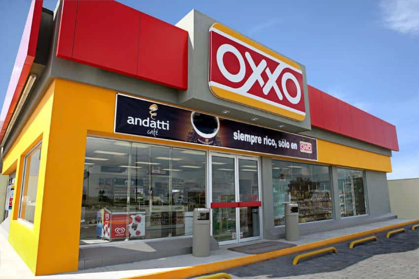 A very typical Oxxo store of today, with its blaring red and yellow facade.