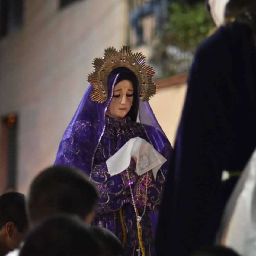 In a mixture of Christian and indigenous rituals, the Virgen de Doloroso represents both the Virgin Mary and the moon during a Holy Thursday procession.