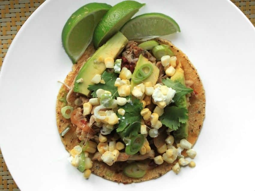 Corn and feta salsa make these chicken tacos out of this world.