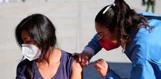 A woman receives a Covid-19 vaccine in Querétaro in December.