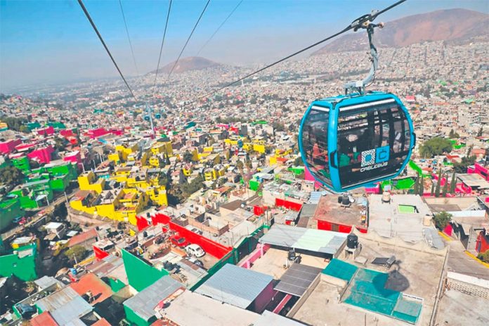 One of the cable cars suspended above the borough of Gustavo A. Madero.