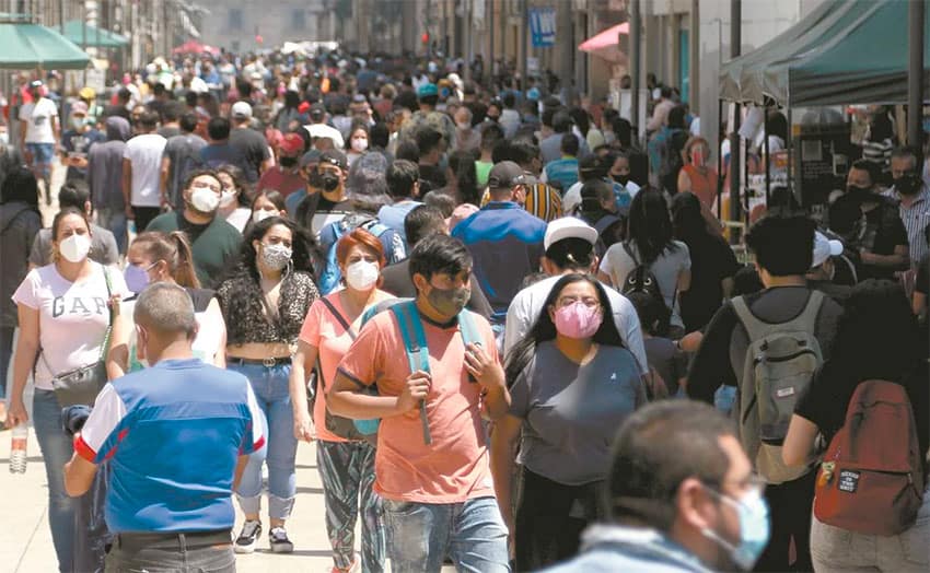 Crowds of pedestrians on Calle Madero in Mexico City.