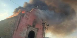 The historic church in flames on Sunday.
