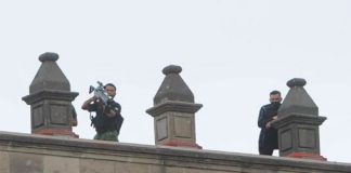 soldiers with anti-drone devices.