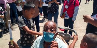 Javier, left, with his great-grandfather and younger brother.