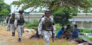 Members of the National Guard patrol the southern border with Guatemala.