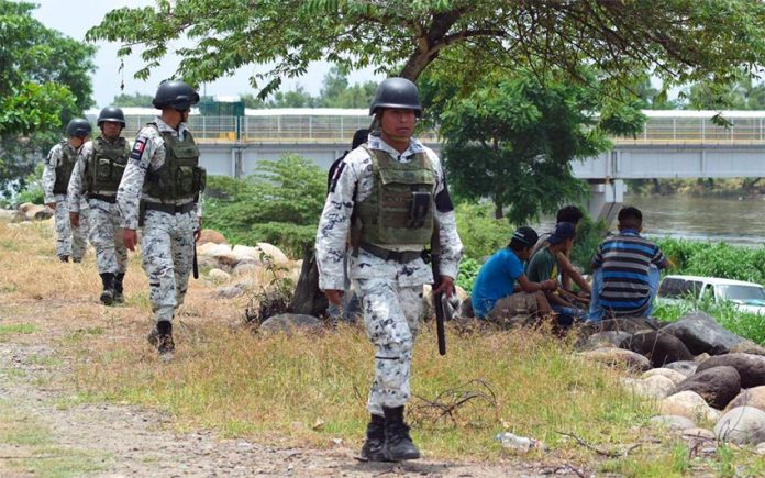 Members of the National Guard patrol the southern border with Guatemala.
