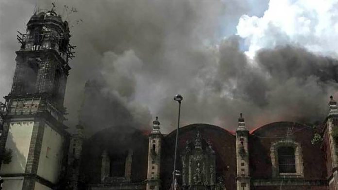 A fire at the Santa Veracruz church last August.