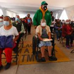 Candidates for vaccination await their turn.