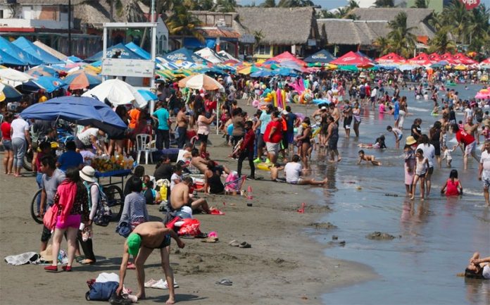 A popular beach in Veracruz on the weekend.