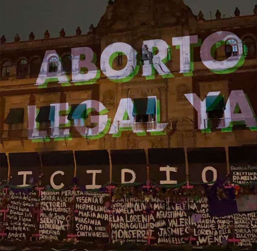 Messages such as 'Legalize abortion now' were projected onto the National Palace Sunday night.