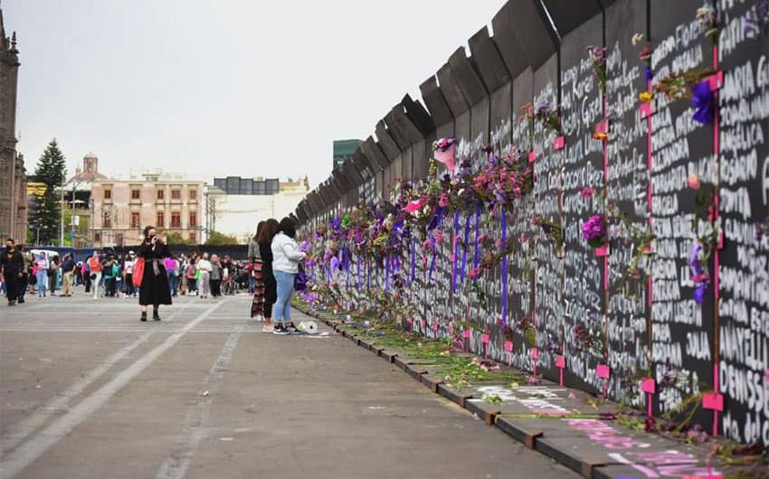 Flowers, crosses and candles have been placed in memory of the victims.