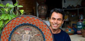 José Luis Cortéz with an example of his pottery.