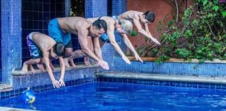 Casa Luna owners Al and Agatha Doerksen daughter Susan (second from left) and her family take an enthusiastic dive in the rental home's tiled pool.