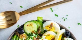 Hard-boiled eggs and tomatoes lend a dash of color to this hearty Nicoise Salad.