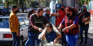 A Covid patient waits in December to be admitted outside Hospital General de La Raza, one of Mexico City’s largest public hospitals.