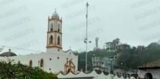 Flyers cling to the pole in Papantla, Veracruz.