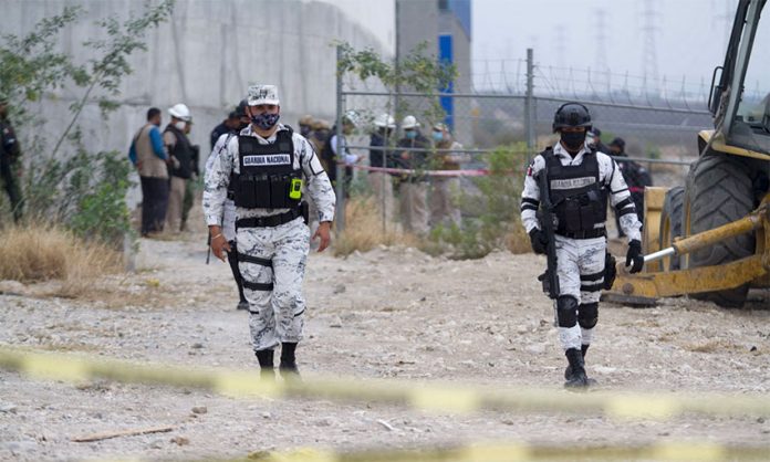 National Guardsmen at a crime scene in Nuevo Laredo.