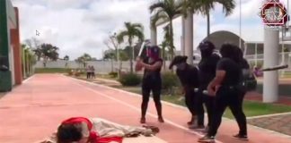 Jesus is down during a reenactment of the Stations of the Cross in Tabasco.