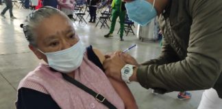 A senior citizen receives a Covid-19 vaccination in Mexico City.