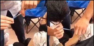 A camera caught the empty syringe during vaccinations last weekend.