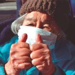 Juanita, aged 101, gives two thumbs up for Covid vaccine