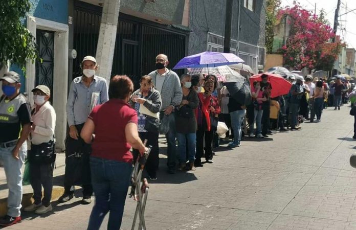 With lines for vaccination like this one earlier this month in Tlaquepaque, Jalisco, some Mexicans who can afford the cost are opting to travel to the US to get a jab.