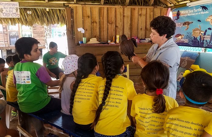 At Campamento Tortuguero Ayotlcali's summer camps, children interact with the refuge's turtles. Educators hope to promote lifelong interest in the animals.