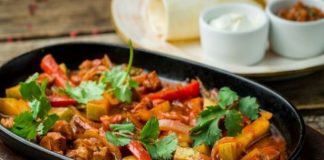 To complement chipotle's smoky flavor, roast the tomatoes in these beef fajitas on a Mexican comal griddle.
