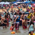A crowded beach in Acapulco in early April.