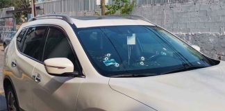 Bullet holes in the windshield of a car in which a candidate for mayor of Acapulco was traveling.