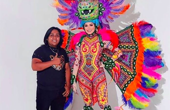Designer Avelino Roque with Miss Universe and her costume.