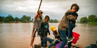 Migrants cross the Suchiate River into Mexico.